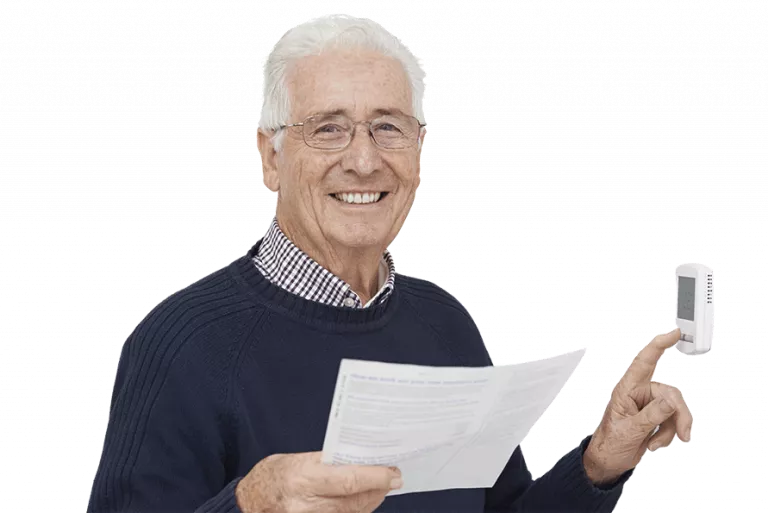 Man controlling the digital controller on wall